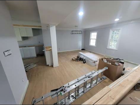 Open main level remodel with new hardwood flooring, completed by Edwin Guardado